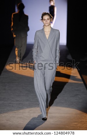 PARIS, FRANCE - MARCH 01: A model walks the runway during the Hakaan Ready to Wear Autumn/Winter 2011/2012 show during Paris Fashion Week at Les Beaux-Arts de Paris on March 1, 2011 in Paris, France.