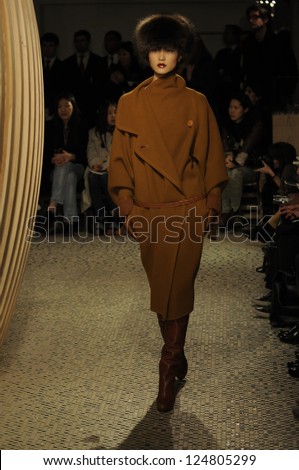 PARIS, FRANCE - MARCH 06: A model walks the runway at the Hermes fashion show during Paris Fashion Week on March 6, 2011 in Paris, France