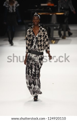 PARIS, FRANCE - MARCH 04: A model walks the runway at the Issey Miyake fashion show during Paris Fashion Week on March 4, 2011 in Paris, France