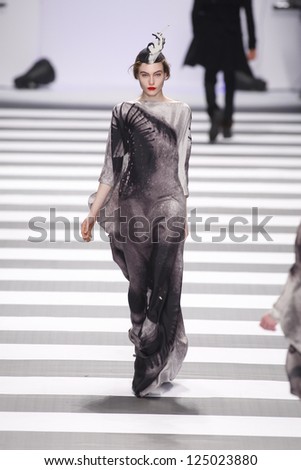 PARIS, FRANCE - MARCH 08: A model walks the runway during the Jean-Charles de Castelbajac Autumn/Winter 2011/2012 show during Paris Fashion Week at Pavillon Concorde on March 8, 2011 in Paris, France.