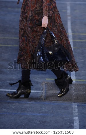 PARIS, FRANCE - MARCH 06: A model walks the runway at the Kenzo fashion show during Paris Fashion Week on March 6, 2011 in Paris, France.