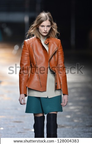 NEW YORK, NY - FEBRUARY 11: A model walks the runway at the 3.1 Phillip Lim fall 2013 fashion show during Mercedes-Benz Fashion Week on February 11, 2013 in New York City.
