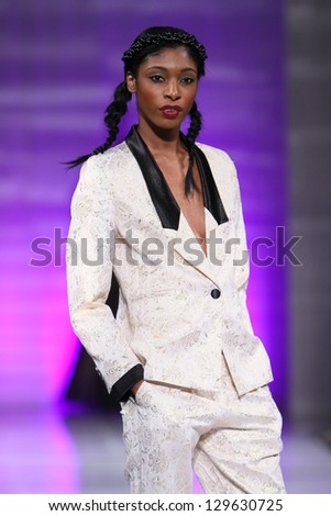 NEW YORK - FEBRUARY 15: A model walks the runway at the Katya Zol Fall Winter 2013 fashion show during Couture Fashion Week on February 15, 2013 in New York City.