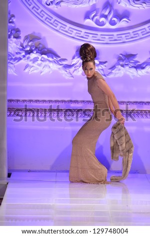 NEW YORK - FEBRUARY 15:  A Model making vogue pose on the Tyrell Mason fashion runway at The New Yorker Hotel during Couture Fashion Week on February 15, 2013 in New York City