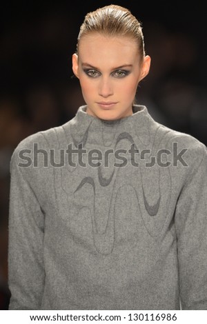NEW YORK - FEBRUARY 08: A model walks the runway at the Academy of Art University Fall Winter 2013 Fashion Show during Mercedes-Benz Fashion Week on February 8, 2013 in New York City.