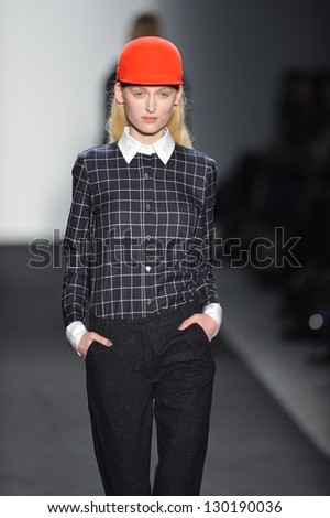 NEW YORK - FEBRUARY 07: A model walks the runway at the Timo Weiland Fall Winter 2013 Women\'s Collection during Mercedes-Benz Fashion Week on February 7, 2013 in New York City.
