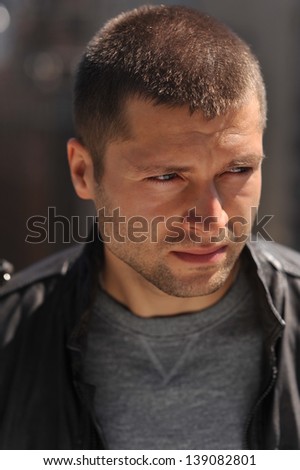 Male actor headshot showing action movie charackter