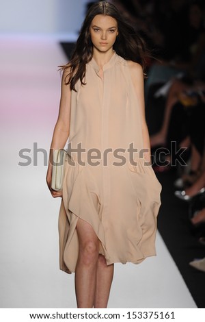NEW YORK, NY - SEPTEMBER 05: A model walks the runway at the BCBGMAXAZRIA show during Spring 2014 Mercedes-Benz Fashion Week at The Theatre at Lincoln Center on September 5, 2013 in New York City.