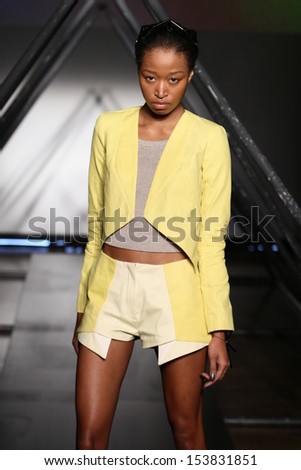NEW YORK, NY - SEPTEMBER 05: A model walks the runway at the Titania Inglis presentation during Mercedes-Benz Fashion Week Spring 2014 at The Standard Hotel on September 5, 2013 in New York City.