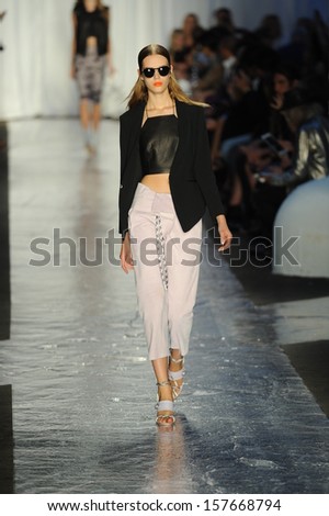 NEW YORK, NY - SEPTEMBER 06: A model walks the runway at the Rag & Bone Women's Collection show during Spring 2014 Mercedes-Benz Fashion Week on September 6, 2013 in New York City.