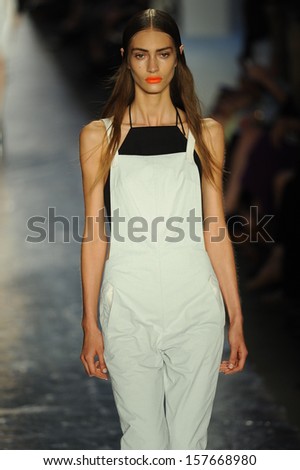 NEW YORK, NY - SEPTEMBER 06: A model walks the runway at the Rag & Bone Women\'s Collection show during Spring 2014 Mercedes-Benz Fashion Week on September 6, 2013 in New York City.
