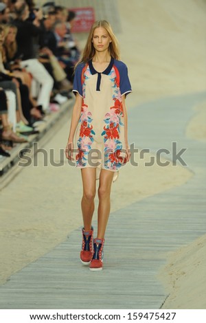 NEW YORK, NY - SEPTEMBER 09: A model walks the runway at the Tommy Hilfiger Women\'s fashion show during Mercedes-Benz Fashion Week on September 9, 2013 in New York City.