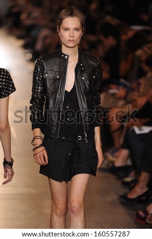 NEW YORK, NY - SEPTEMBER 10: A model walks the runway at the Diesel Black Gold show during Spring 2014 Mercedes-Benz Fashion Week at Grand Central Terminal on September 10, 2013 in New York City.
