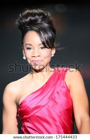 NEW YORK, NY - FEBRUARY 06: Anika Noni Rose walks the runway wearing Pamella Roland at Go Red For Women - The Heart Truth Red Dress Collection 2014 Show on February 6, 2014 in New York City.