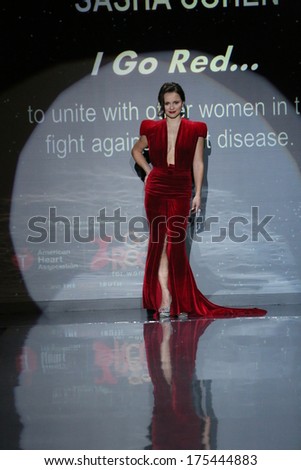 NEW YORK, NY - FEBRUARY 06: Sasha Cohen walks the runway wearing Marc Bouwer at Go Red For Women - The Heart Truth Red Dress Collection 2014 Show on February 6, 2014 in New York City.