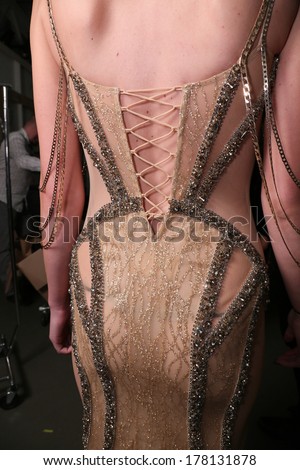 NEW YORK, NY - FEBRUARY 12: Designer Dany Tabet works backstage at the Dany Tabet show during Nolcha Fashion Week Fall/Winter 2014 at Pier 59 on February 12, 2014 in NYC