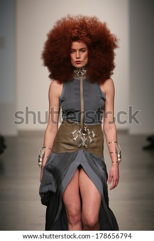 NEW YORK, NY - FEBRUARY 12: Gender-bending female top model Elliott Sailors walks the runway at the Nina Athanasiou show during Nolcha Fashion Week  Fall/Winter 2014 on February 12, 2014 in NYC