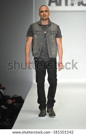 LOS ANGELES, CA - MARCH 11: A model walks runway at Artistix show during Style Fashion Week Fall 2014 at The Live Event Arena on March 11, 2014 in Los Angeles