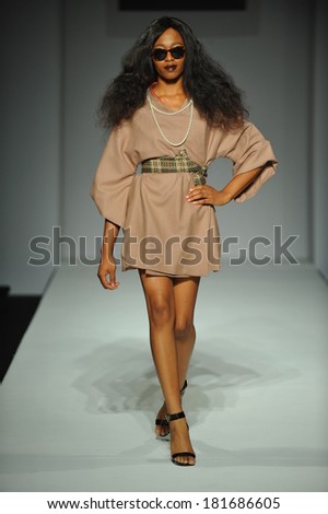 LOS ANGELES, CA - MARCH 10: A model walks the runway at Mariely Pratts fashion show during Style Fashion Week Fall 2014 at The Live Arena on March 10, 2014 in Los Angeles.