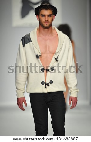 LOS ANGELES, CA - MARCH 11: A model walks runway at M The Movement show during Style Fashion Week Fall 2014 at The Live Event Arena on March 11, 2014 in Los Angeles