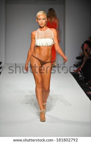 LOS ANGELES, CA - MARCH 11: A model walks runway at Miss Kinsman Swim show during Style Fashion Week Fall 2014 at The Live Event Arena on March 11, 2014 in Los Angeles