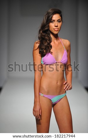 Los Angeles, CA - MARCH 11: A model walks the runway at Skinny Bikini swimsuit show during Style Fashion Week Fall 2014 at The LA Live Event Deck on March 11, 2014 in LA.