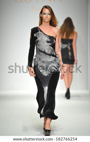 Los Angeles, CA - MARCH 13: A model walks the runway at Quynh Paris fashion show during Style Fashion Week Fall 2014 at The LA Live Event Deck on March 13, 2014 in LA.