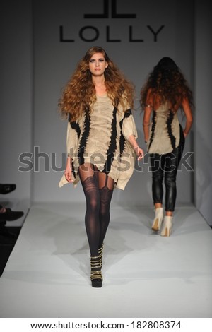 Los Angeles, CA - MARCH 13: A model walks the runway at Lolly Clothing fashion show during Style Fashion Week Fall 2014 at The LA Live Event Deck on March 13, 2014 in LA.