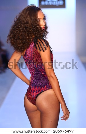 MIAMI - JULY 21: Model walks runway at AZ Araujo Swimwear collection during MBFW Miami Swim on July 21, 2014 in Miami Beach Florida