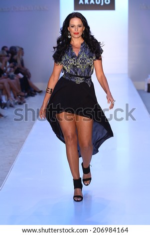 MIAMI BEACH, FL - JULY 21: Model/Business woman Cozete Gomes walks the runway at the A.Z Araujo show during Mercedes-Benz Fashion Week Swim 2015 on July 21, 2014 in Miami Beach, Florida.