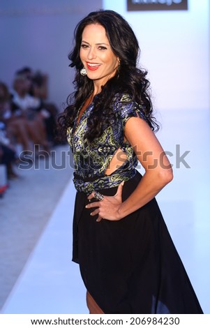 MIAMI BEACH, FL - JULY 21: Model/Business woman Cozete Gomes walks the runway at the A.Z Araujo show during Mercedes-Benz Fashion Week Swim 2015 on July 21, 2014 in Miami Beach, Florida.