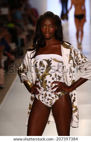 MIAMI - JULY 21: Model walks runway at Aguaclara Swimwear collection during MBFW Miami Swim on July 21, 2014 in Miami Beach Florida