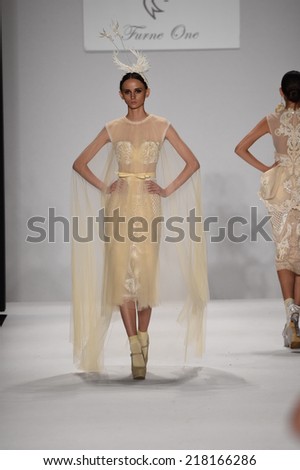 NEW YORK - SEPTEMBER 11: A model walks runway for Furne Amato Spring/Summer 2015 fashion show at Mercedes-Benz Fashion Week during New York Fashion Week on September 11, 2014 in NYC.