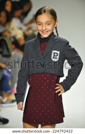 NEW YORK, NY - OCTOBER 18: A model walks the runway during the Parsons preview at petite PARADE Kids Fashion Week at Bathhouse Studios on October 18, 2014 in New York City.