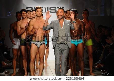 NEW YORK, NY - OCTOBER 21: 2(X)IST Creative Director Jason Scarlatti and models walk the runway during 2(X)IST Men's Spring/Summer 2015 Runway Show on October 21, 2014 in New York City.