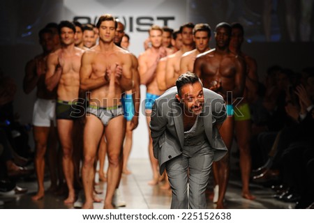 NEW YORK, NY - OCTOBER 21: 2(X)IST Creative Director Jason Scarlatti and models walk the runway during 2(X)IST Men\'s Spring/Summer 2015 Runway Show on October 21, 2014 in New York City.