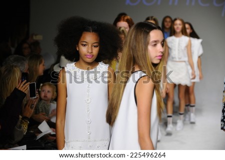NEW YORK, NY - OCTOBER 19: Models walk the runway finale during the Bonnie Young preview at petitePARADE Kids Fashion Week at Bathhouse Studios on October 19, 2014 in New York City.