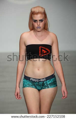 NEW YORK, NY - OCTOBER 25: A model walks runway at Finale Runway Show during Lingerie Fashion week closing benefit Spring 2015 collections at the Center 548 on October 25, 2014 in New York City.
