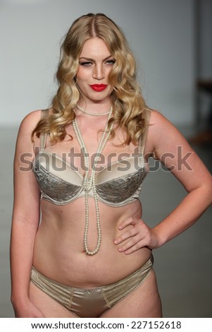 NEW YORK, NY - OCTOBER 25: A model walks runway at Finale Runway Show during Lingerie Fashion week closing benefit Spring 2015 collections at the Center 548 on October 25, 2014 in New York City.