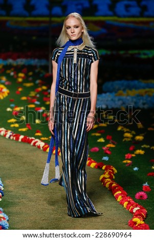 NEW YORK, NY - SEPTEMBER 08: A model walks the runway at Tommy Hilfiger Women\'s fashion show during Mercedes-Benz Fashion Week Spring 2015 at Park Avenue Armory on September 8, 2014 in New York City.