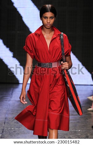 NEW YORK, NY - SEPTEMBER 08: Model Imaan Hammam walk the runway at Donna Karan New York during MBFW Spring 2015 at 547 West 26th Street on September 8, 2014 in NYC