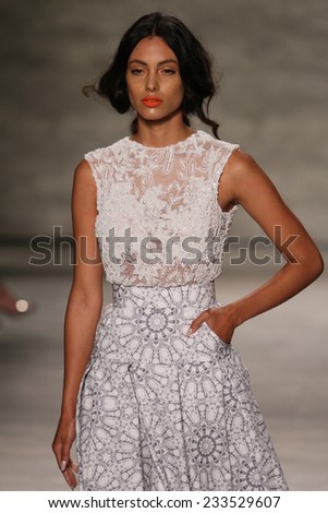 NEW YORK, NY - SEPTEMBER 06: A model walks the runway at the Luis Antonio fashion show during Mercedes-Benz Fashion Week Spring 2015 at Lincoln Center on September 6, 2014 in NYC