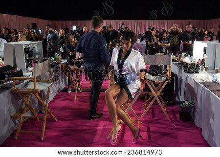 LONDON, ENGLAND - DECEMBER 02: Atmosphere backstage with Imaan Hammam at the annual Victoria\'s Secret fashion show at Earls Court on December 2, 2014 in London, England.