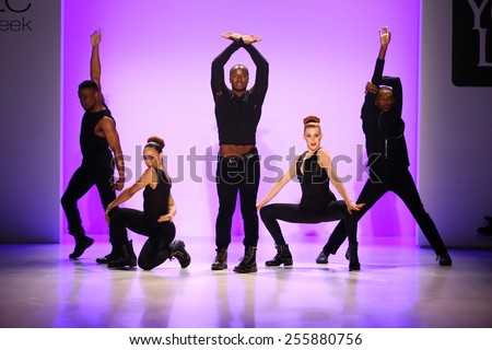 NEW YORK, NY - FEBRUARY 19:Group of dancers performs at opening of the New York Life fashion show during MBFW Fall 2015 at Lincoln Center on February 19, 2015 in NYC.