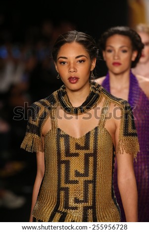 NEW YORK, NY - FEBRUARY 19: Models walk the runway in a Li Jon Sculptured Couture design at the Art Hearts Fashion show during MBFW Fall 2015 at Lincoln Center on February 19, 2015 in NYC