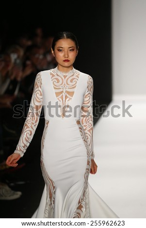 NEW YORK, NY - FEBRUARY 19: A model walks the runway in a Walter Mendez design at the Art Hearts Fashion show during MBFW Fall 2015  at Lincoln Center on February 19, 2015 in NYC.