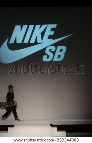 NEW YORK, NY - FEBRUARY 12: Nike logo the runway at the Nike Levi\'s Kids fashion show during Mercedes-Benz Fashion Week Fall 2015 at Lincoln Center on February 12, 2015 in NYC