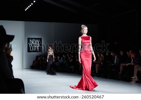 NEW YORK, NY - FEBRUARY 19: A model walks runway in Dany Tabet dress at the New York Life fashion show during MBFW Fall 2015 on February 19, 2015 in NYC.
