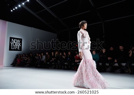 NEW YORK, NY - FEBRUARY 19: A model walks runway at the New York Life fashion show during MBFW Fall 2015 at Lincoln Center on February 19, 2015 in NYC.