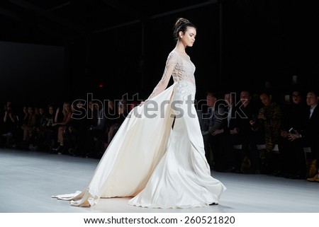 NEW YORK, NY - FEBRUARY 19: A model walks runway in Dany Tabet dress at the New York Life fashion show during MBFW Fall 2015 on February 19, 2015 in NYC.